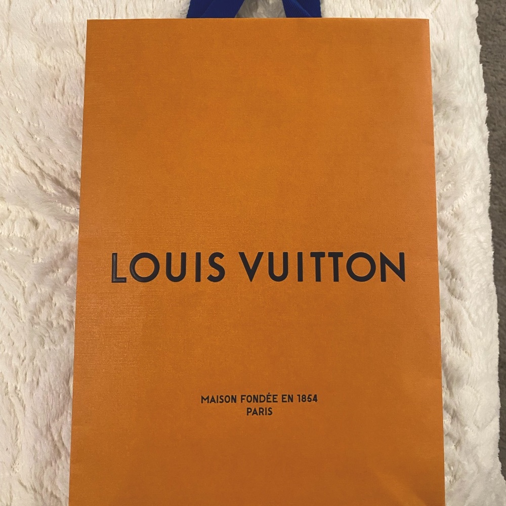 Louis Vuitton Wristlet came w/ Never-Full handbag. Bought in 2021 in Miami